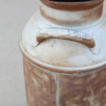 Rusty Rivet Details on a Vintage Milk Can
